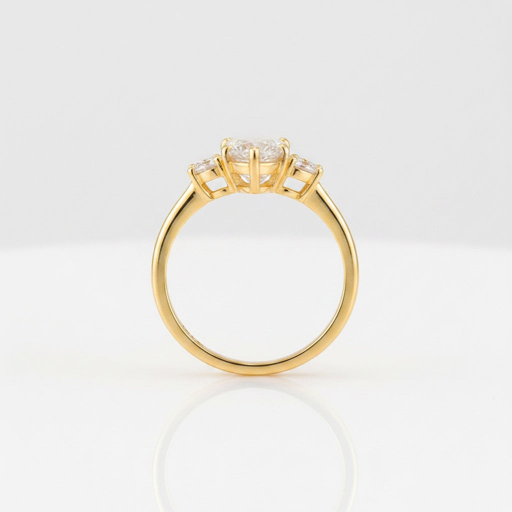 Aurevyn 3.0 Ct Pear Cut Yellow Gold Engagement Ring with Round Cut Side Stone