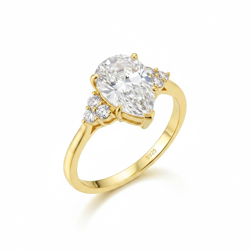 Aurevyn 3.0 Ct Pear Cut Yellow Gold Engagement Ring with Round Cut Side Stone