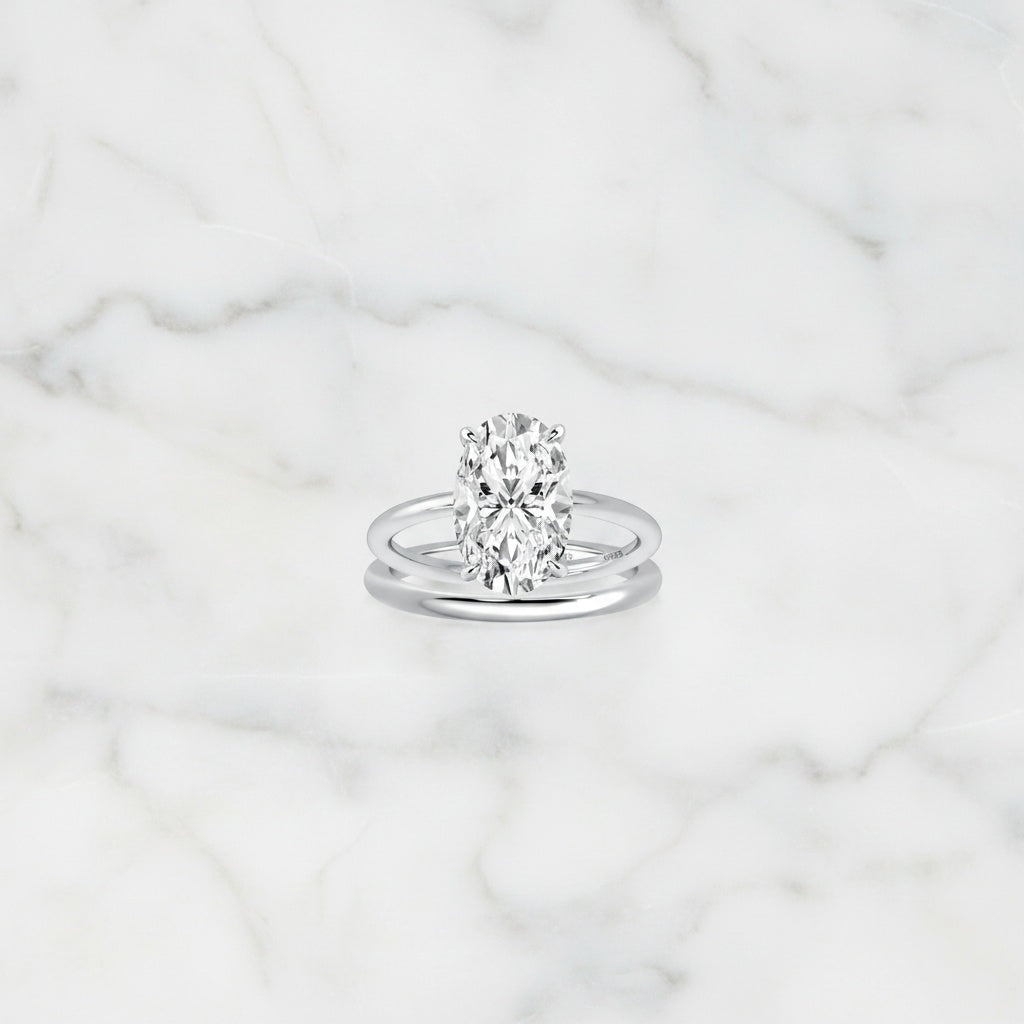 Aurevyn 4.0Ct Solitaire Oval Cut White Gold Engagement Ring with Plain Wedding Band