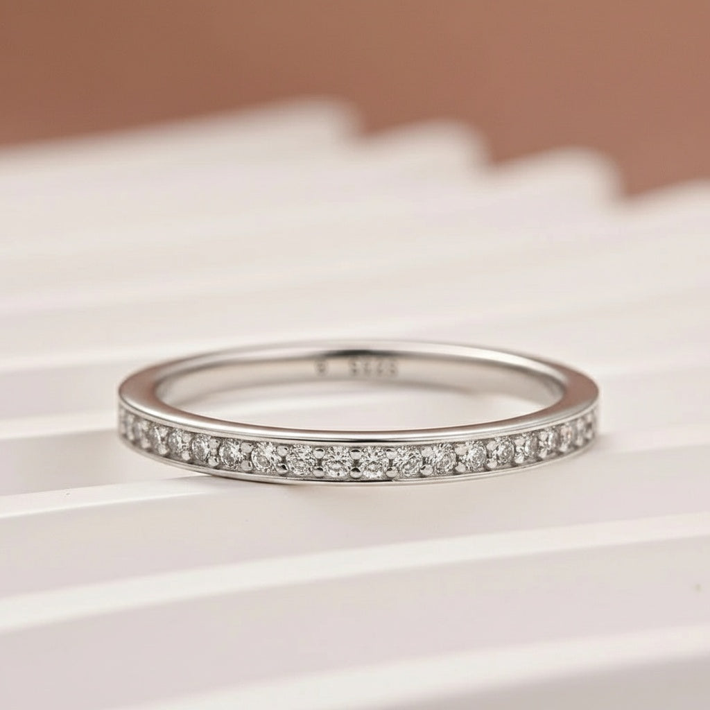 Aurevyn Channel Set Round Cut Wedding Ring In 925 Sterling Silver