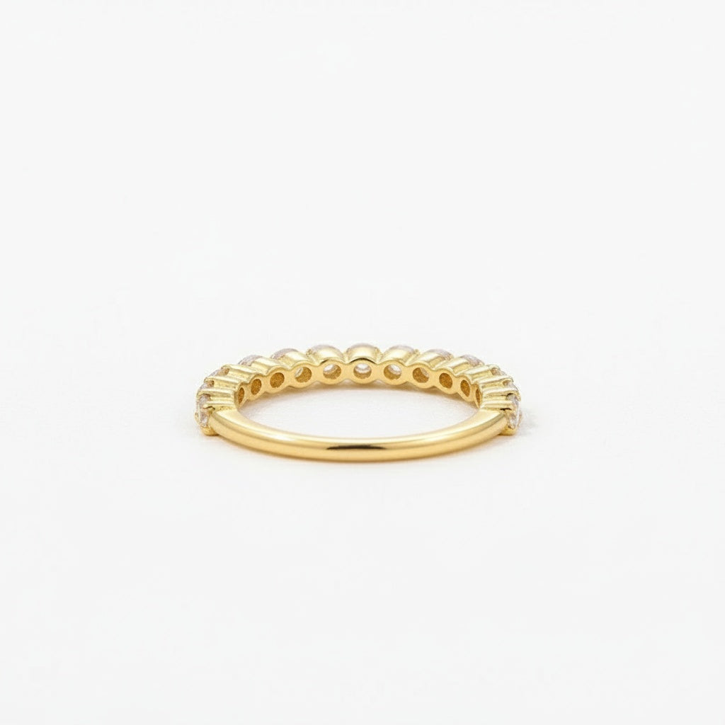 Aurevyn Moissanite 0.6Ct Classic Round Cut Half Yellow Gold Wedding Band In Sterling Silver
