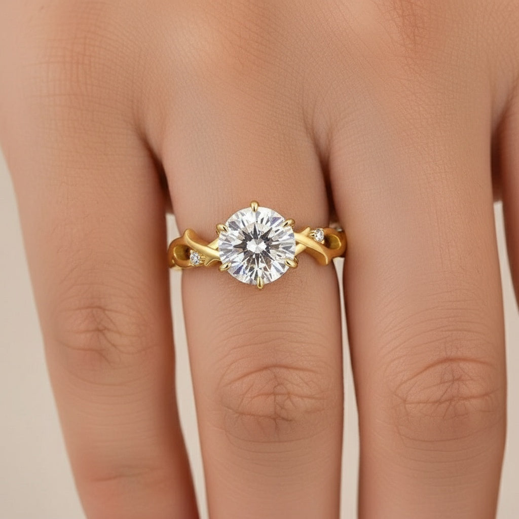 Aurevyn Moissanite 2.0 Ct Twig 6 Prong Round Cut Twist Yellow Gold Engagement Ring