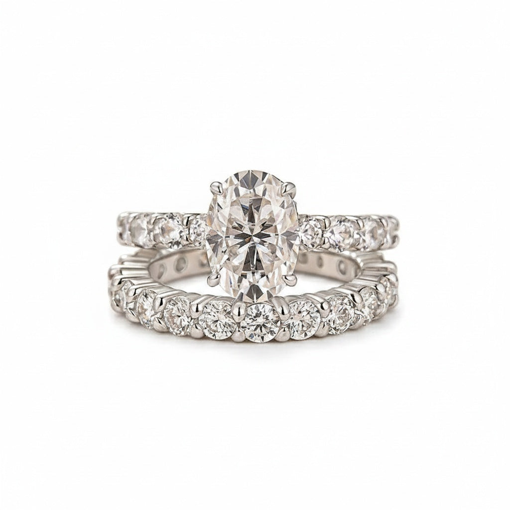 Aurevyn Moissanite 2.5Ct Oval Cut Side Stone White Gold Engagement Ring with Pavé Eternity Ring