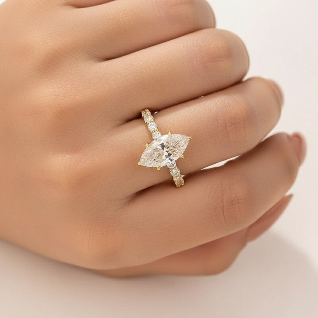 Aurevyn Moissanite 3.0 Ct Marquise Cut Side Stone Yellow Gold Engagement Ring