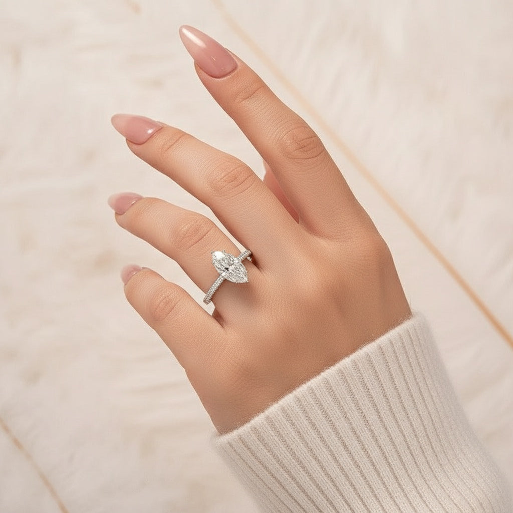 Aurevyn Moissanite 3.0Ct Marquise Cut Solitaire Engagement Ring with Pave Three-Sided Band in 18K White Gold Plated Sterling Silver