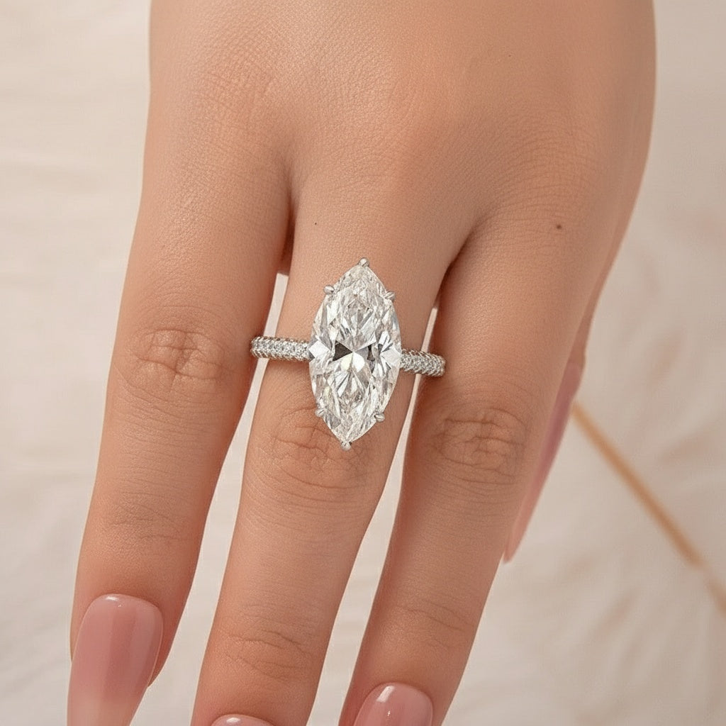 Aurevyn Moissanite 3.0Ct Marquise Cut Solitaire Engagement Ring with Pave Three-Sided Band in 18K White Gold Plated Sterling Silver