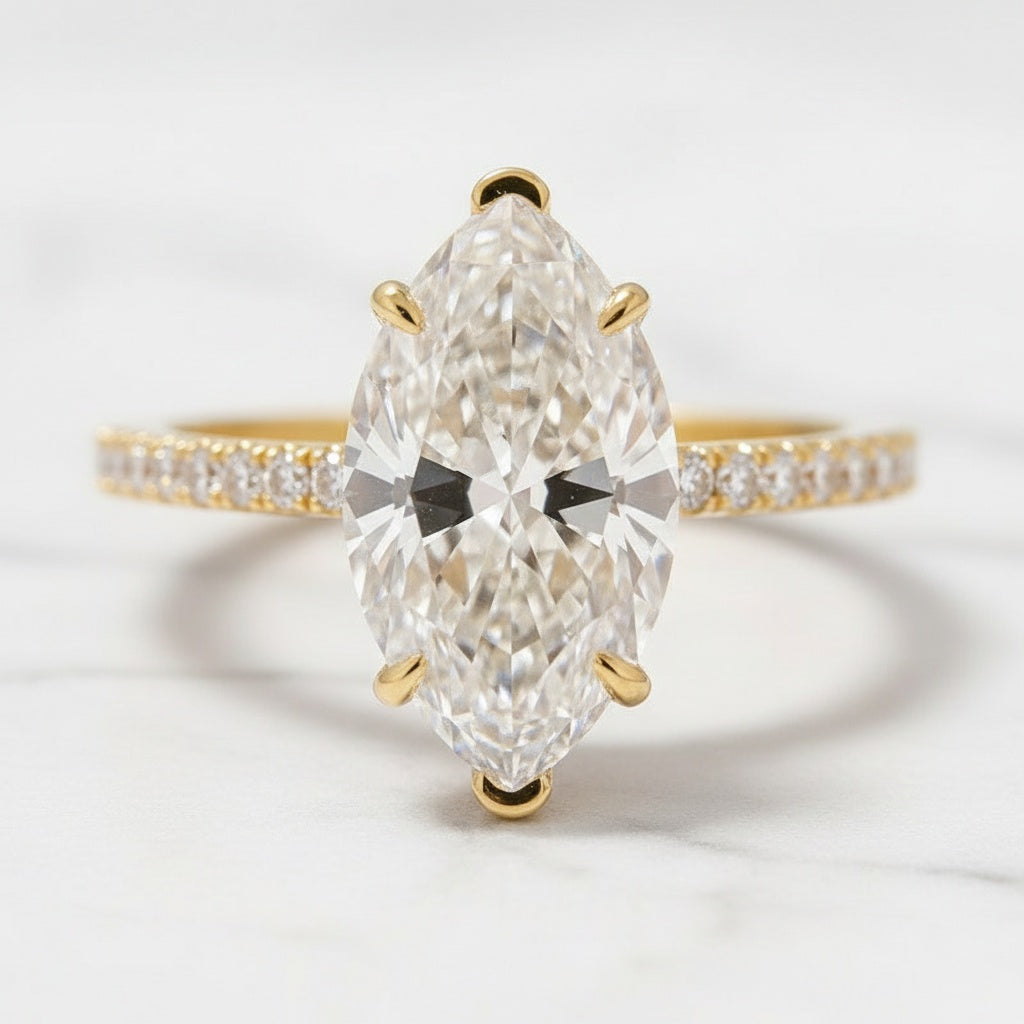 Aurevyn Moissanite 4.0 Ct Marquise Cut Yellow Gold Half-Coverage Wedding Set