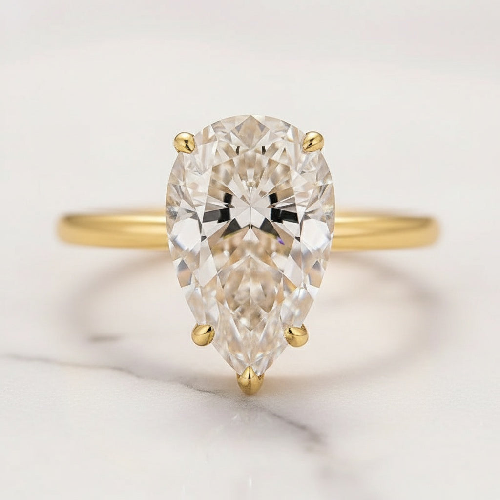Aurevyn Moissanite 4.0 Ct Pear Cut Yellow Gold Engagement Ring For Women with Graduated Tiara Wedding Ring