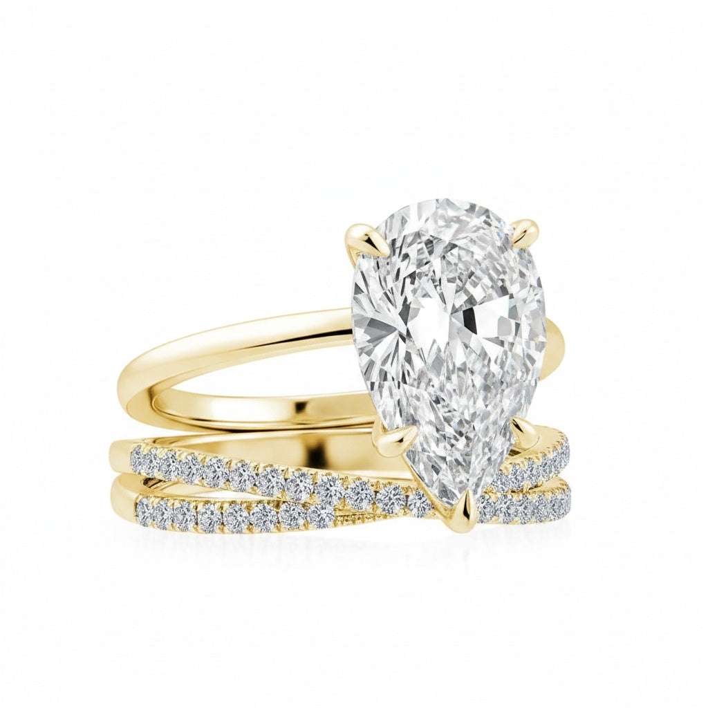 Aurevyn Moissanite 4.0 Ct Pear Cut Yellow Gold Wedding Ring With X Criss Cross Wedding Band