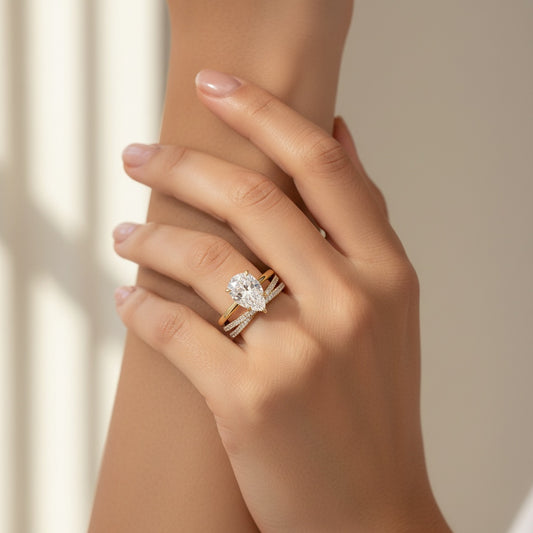 Aurevyn Moissanite 4.0 Ct Pear Cut Yellow Gold Wedding Ring With X Criss Cross Wedding Band