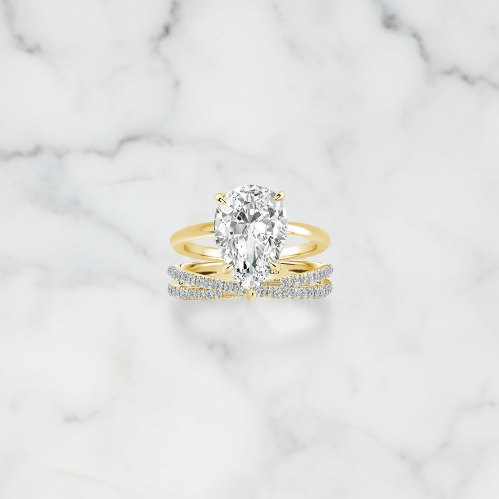 Aurevyn Moissanite 4.0 Ct Pear Cut Yellow Gold Wedding Ring With X Criss Cross Wedding Band
