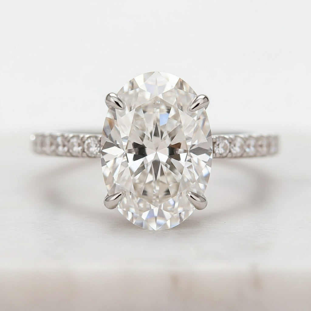 Aurevyn Moissanite 4.0Ct Hidden Halo Oval Cut White Gold Engagement Ring with 3.0Ct Oval Cut Wedding Band