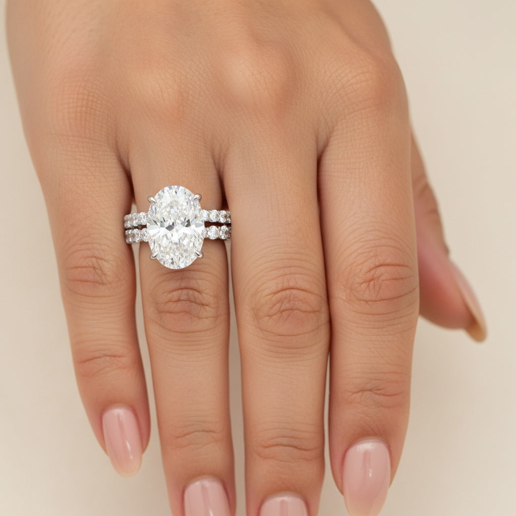Aurevyn Moissanite 4.0Ct Hidden Halo Oval Cut White Gold Engagement Ring with 3.0Ct Oval Cut Wedding Band