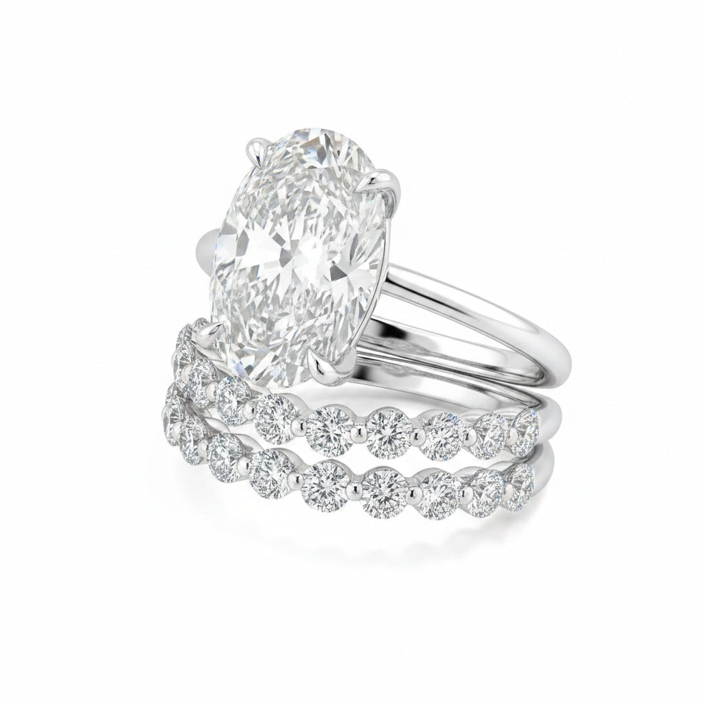 Aurevyn Moissanite 5.5Ct Hidden Halo Oval Cut Engagement Ring with 1.5 Ct Round Cut Yellow Gold Anniversary Ring