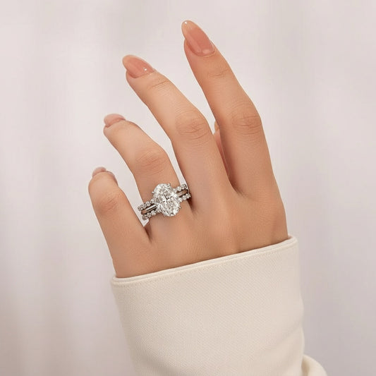 Aurevyn Moissanite 5.5Ct Hidden Halo Oval Cut Engagement Ring with 1.5 Ct Round Cut Yellow Gold Anniversary Ring