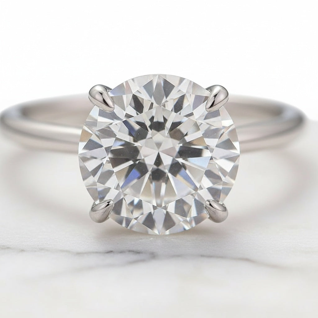 Aurevyn Moissanite Solitaire 2.0 Ct Round Cut White Gold Engagement Ring with Round & Marquise Accents Bands