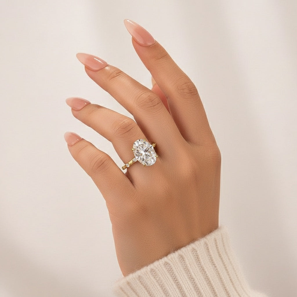 Aurevyn Yellow Gold 5.5 Ct Oval Cut Moissanite Engagement Ring In Sterling Silver