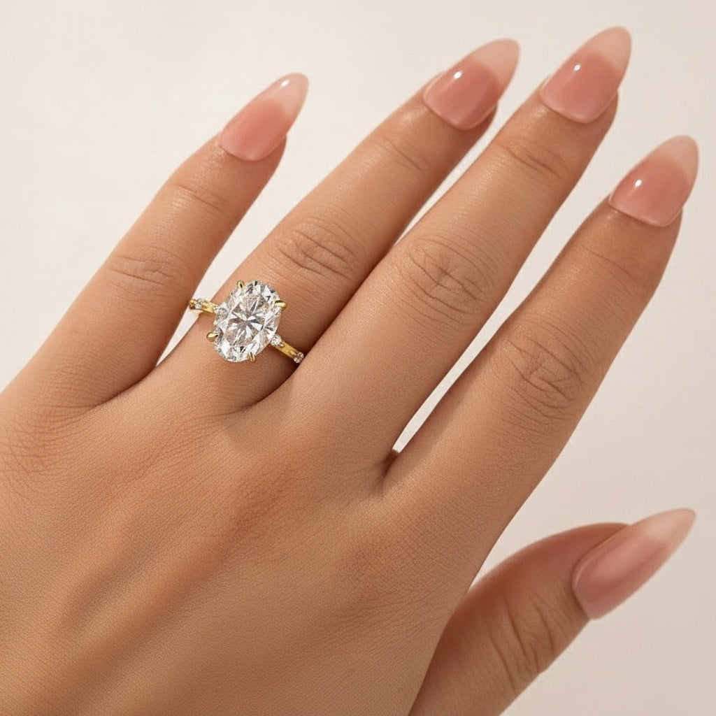 Aurevyn Yellow Gold 5.5 Ct Oval Cut Moissanite Engagement Ring In Sterling Silver